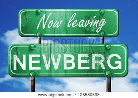 Now leaving newberg road sign with blue sky