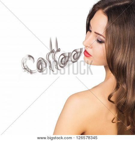 Young woman inhaling coffee aroma isolated on white