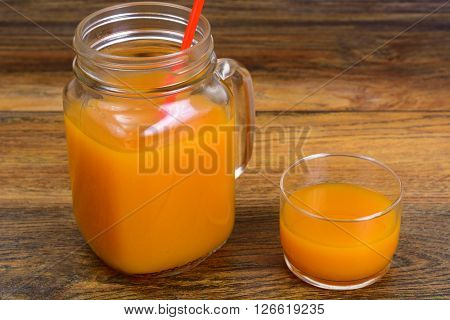Healthy food: pumpkin juice, apple, orange, multifruit. Studio Photo