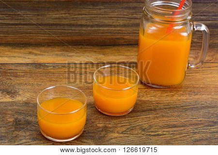 Healthy food: pumpkin juice, apple, orange, multifruit. Studio Photo