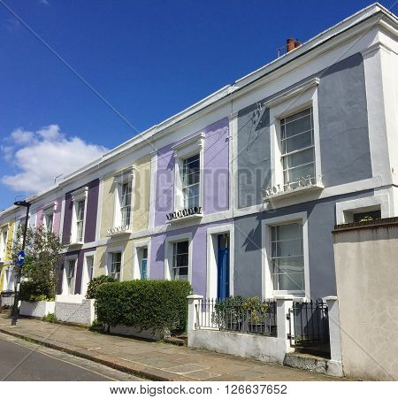 LONDON - APRIL 19: Vibrant terraced houses on April 19, 2016 in Kentish Town, London, UK.