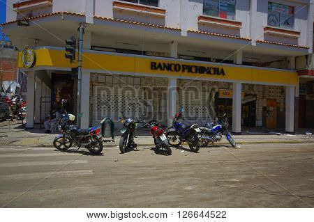 Portoviejo, Ecuador - April, 18, 2016: Pichincha Bank with ATM showing the aftereffect of 7.8 earthquake that destroyed the city center.