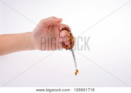 Hand Holding A Tespih