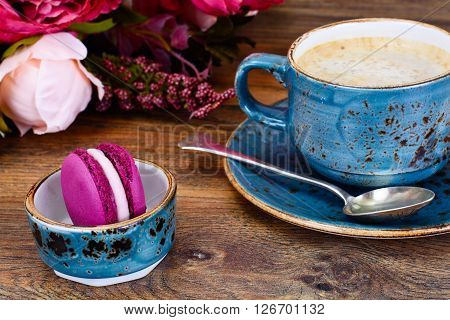 Sweet  French Macaroons with Cofee Cup. Studio Photo