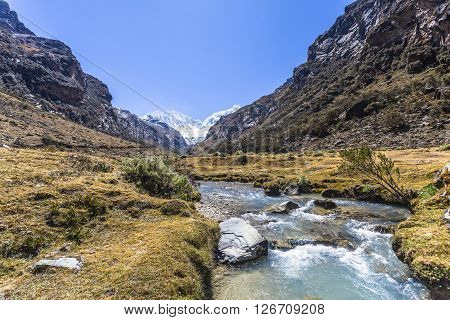 Walk to approach the lagoon Llaca Huaraz Peru.