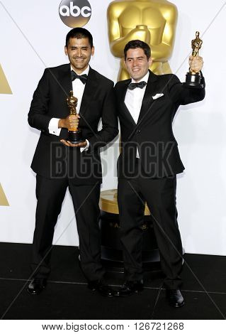 Gabriel Osorio Vargas and Pato Escala Pierart at the 88th Annual Academy Awards - Press Room held at the Loews Hotel in Hollywood, USA on February 28, 2016.
