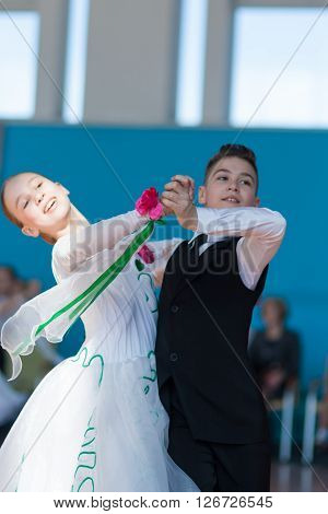 Minsk Belarus -April 3 2016: Panasyuk Maksim and Belyankina Liana Perform Juvenile-1 Standard Program on the IDSA Championship Kinezis Star Cup - 2016 in April 3 2016 in Minsk Republic of Belarus