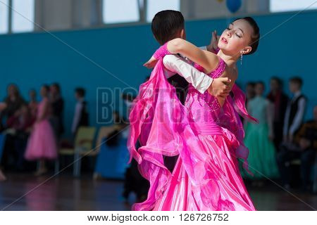 Minsk Belarus -April 3 2016: Unidentified Dance Couple Performs Youth-2 Standard Program on the IDSA Championship Kinezis Star Cup - 2016 in April 3 2016 in Minsk Republic of Belarus