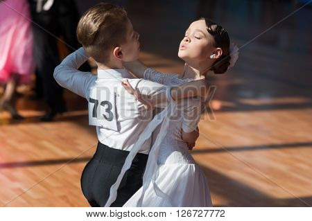 Minsk Belarus -April 3 2016: Hamko Egor and Bloshentceva Diana Perform Juvenile-1 Standard European Program on the IDSA Championship Kinezis Star Cup - 2016 in April 3 2016 in Minsk Republic of Belarus