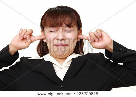 Asian businesswoman suffers from noise on white background