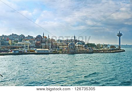 The Uskudar embankment with the old mosques cozy cafes and tea houses is the pearl of the Asian side of the city Istanbul Turkey.