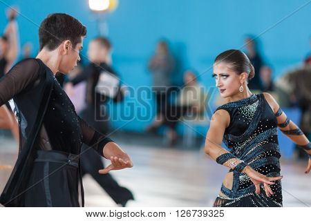 Minsk Belarus -April 3 2016: Silich Sergey and Borovskaya Olga Perform Youth Latin-American Program on IDSA Championship Kinezis Star Cup - 2016 in April 3 2016 in Minsk Republic of Belarus