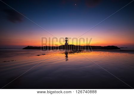 Light house with twilight sky, nature and landscape scene.