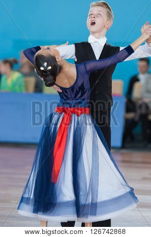 Minsk Belarus -April 3 2016: Prahov Ivan and Sapkevich Ekaterina Perform Youth-2 Standard Program on the IDSA Championship Kinezis Star Cup in April 3 2016 in Minsk Republic of Belarus