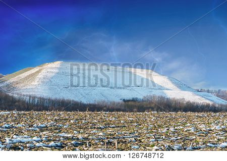 Snowy Mountain a landfill dump in the winter.