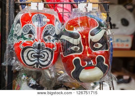 YOKOHAMA JAPAN - NOVEMBER 24 2015: Chinese masks in a souvenir shop at Yokohama Chinatown