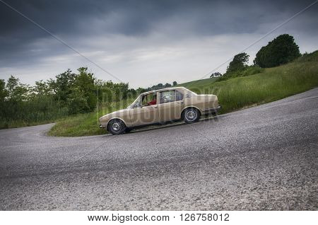 PESARO, ITALY - MAY 15: Alfa romeo  Alfetta  on an old racing car in rally Mille Miglia 2015 the famous italian historical race (1927-1957) on May 2015