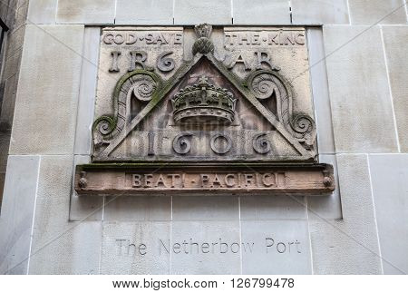 One of the old signs from Netherbow Port which once stood on the Royal Mile in Edinburgh. The sign is now displayed on the exterior of the Scottish Storytelling Centre on the Royal Mile.