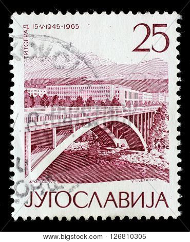 ZAGREB, CROATIA - JUNE 14: A stamp printed by Yugoslavia shows Titograd(Podgorica), The 20th Anniversary of Liberation issue, circa 1965, on June 14, 2014, Zagreb, Croatia