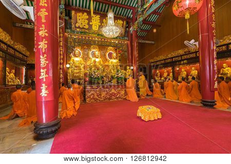 Bangkok Thailand - March 6 2016 : Thai monk worship in temple at Wat Mangkon Kamalawat (Wat Leng Noei Yi). Wat Leng Noei Yi is the most important Chinese Buddhist temple in Bangkok Thailand.