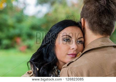 amorous couple in a park