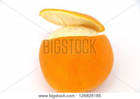 good juicy orange with peel cut in a circle on a white background