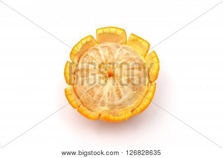 good juicy orange peel cut out in a circle and stripes on a white background