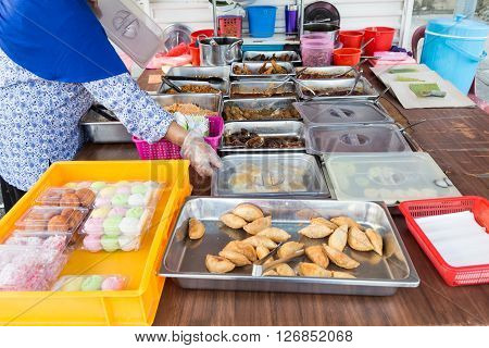 Vendor Selling Assorted Malay Sweet Cakes Food At Street Stall