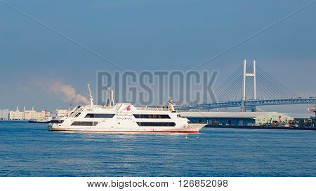 YOKOHAMA JAPAN - NOVEMBER 24 2015: Yokohama Port has 10 major piers. In 2013 the Port served 37706 ships. It handled 271276977 tons of cargo and 2888220 TEU containers