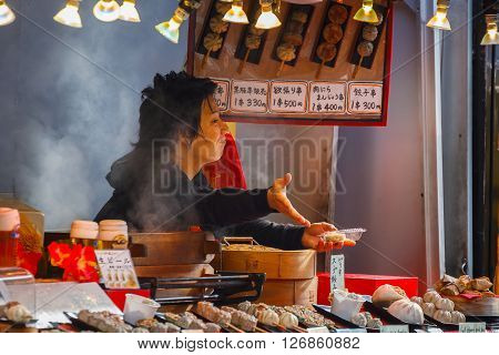 YOKOHAMA JAPAN - NOVEMBER 24 2015: Chinese food vendor on the side of streets of Yokohama Chinatown