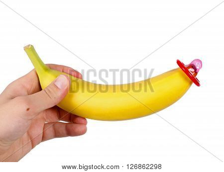 Man holding a banana with a condom