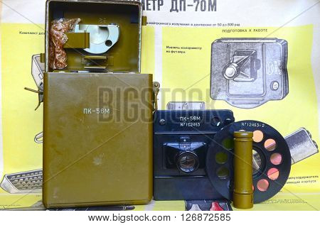 ILLUSTRATIVE EDITORIAL.Soviet military chemical radiometer DP70 & color of solutions compare set PK56m.Back-poster of individual radiometers DP-70 & PK56m, design and usage.April 19,2016 Kiev, Ukraine
