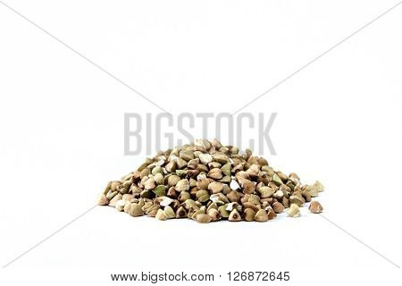 handful of green buckwheat closeup isolated on white background