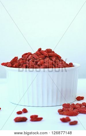 Chinese Goji In The Bowl On The White Background