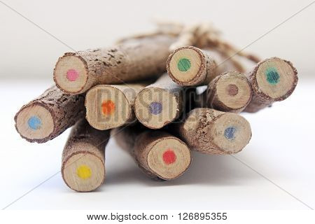 Brown wooden pencils isolated on white baclground.