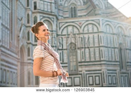 Woman Tourist Standing Near Duomo And Looking Into Distance