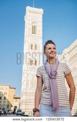 Smiling Young Woman Tourist Sightseeing In Florence, Italy