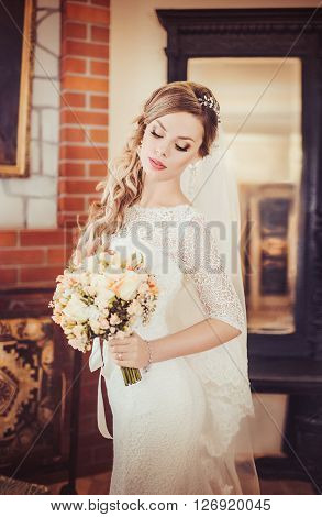 Beautiful bride in white dress on her wedding day
