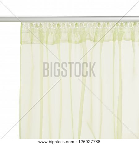 Fragment of the light green translucent organza curtain with mount. Back view. Isolated on white background. Include path.