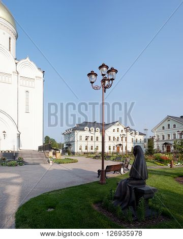 Orthodox Church street lamp and the statue of the Saint