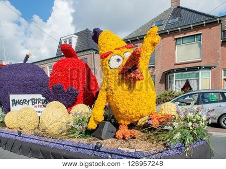 HILLEGOM, THE NETHERLANDS - APRIL 23, 2016: Moving platform made in a form of angry birds from the famous game and movie. Taking part in the  traditional flowers parade 