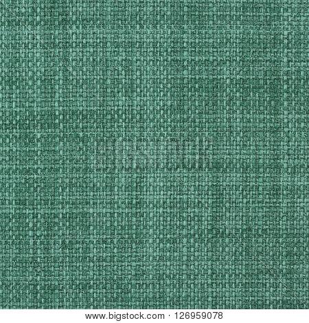 Flag green fabric texture. Close up top view.