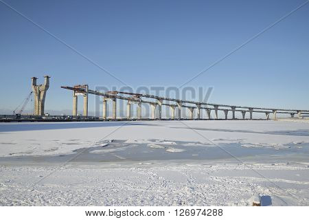 View of the frozen gulf of Finland and construction of the WHSD central section, winter day. Saint Petersburg