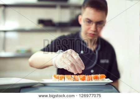 Cooks Preparing Sush