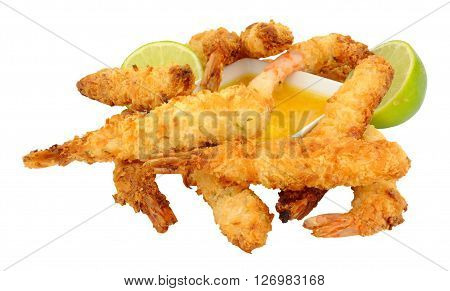 Coconut and batter coated prawns with fresh lime isolated on a white background
