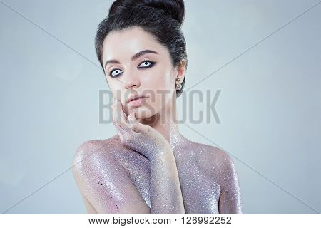 Potrtait of woman with beautiful creative fashion makeup