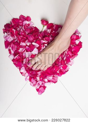 Pink Heart And Pink Nail Polish On White Background. Morning Of St. Valentine's Day. Pink Pedicure F