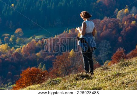 Woman Tourist In Autumn Carpathian Mountains Hill Top With Multicolored Trees (rakhiv Pass, Transcar