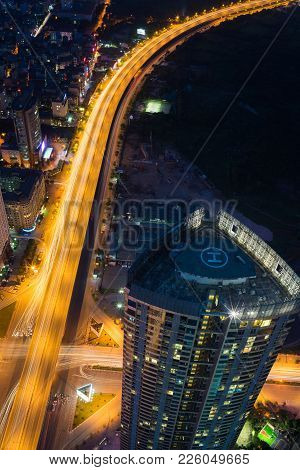 Aerial View Of Hanoi Cityscape At Twilight Period With Skyscraper And Intersection Pham Hung - Duong