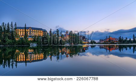 Sunset Over Glacial Mountain Lake Strbske Pleso In National Park High Tatra, Slovakia. Long Exposure